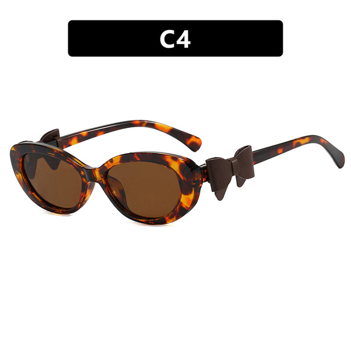Women's fashionable sunglasses with playful bow design Kalsten