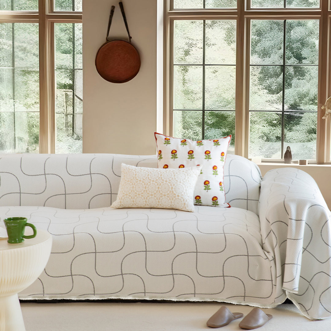 Multi-functional sofa cover and bedspread with woven floral pattern
