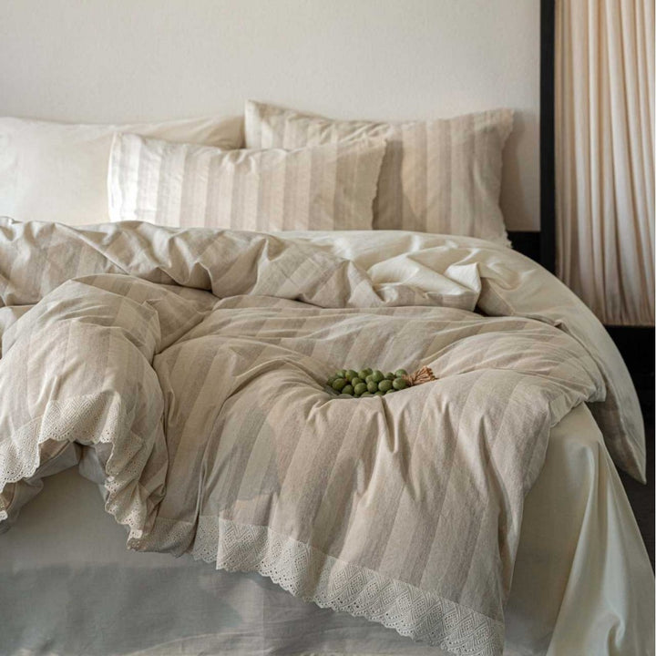 Bedding set with polka dot dobby texture and eyelet embroidery frill