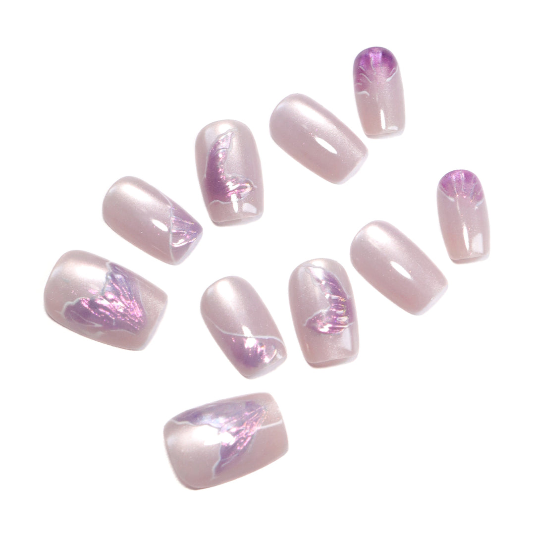 Artfully designed nail extensions with elegant flower motifs Kalsten