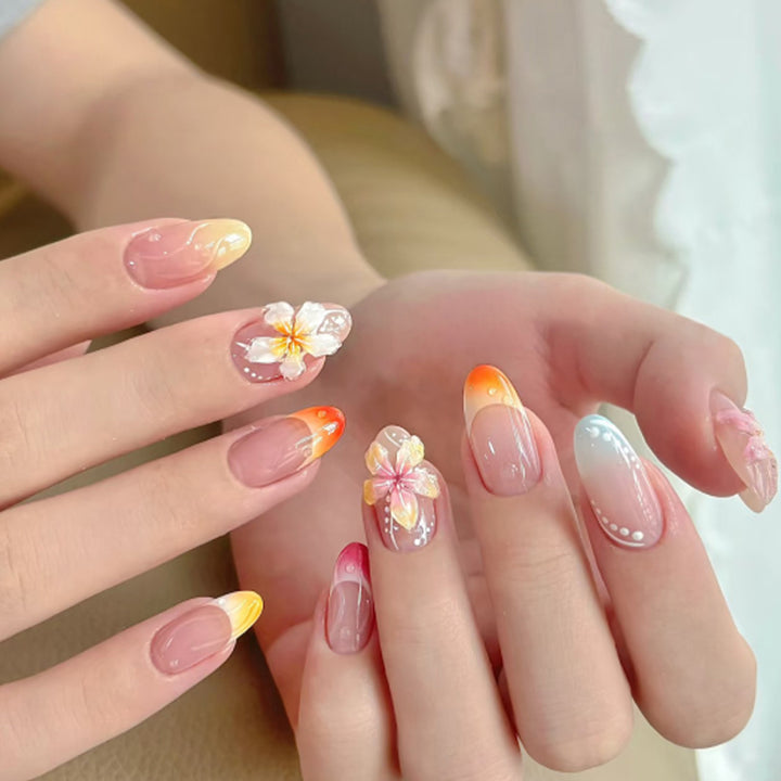 Artistic nail designs with floral accents and soft color gradients Kalsten