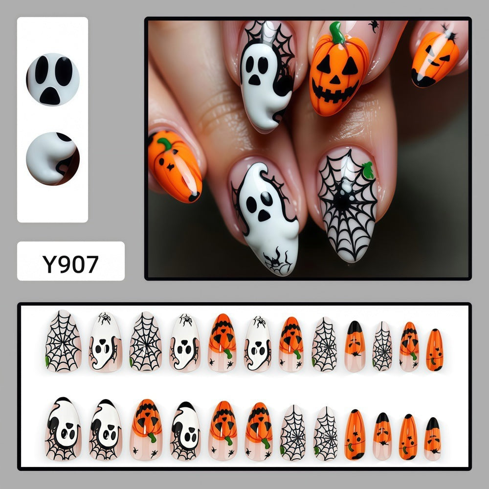 Halloween-themed artificial nails with spooky ghost and pumpkin design Kalsten