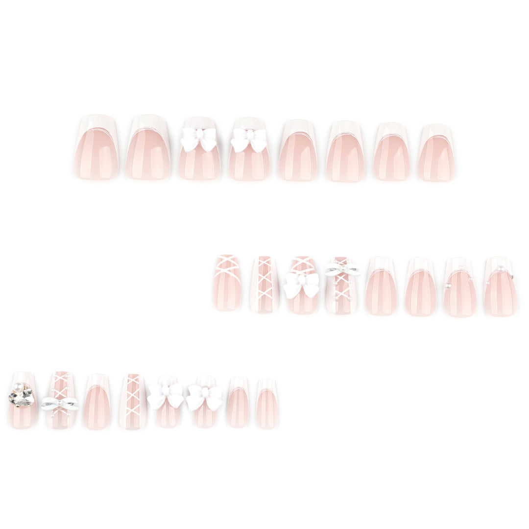 Artful Nail Art with Bows and Rhinestone Decorations Kalsten