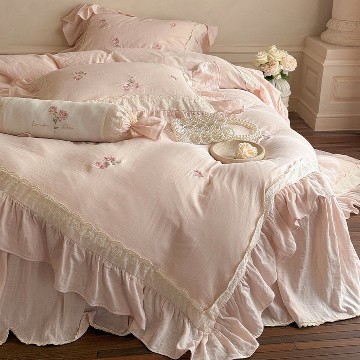 Romantic bedding set made of linen-cotton blend with ruffles and floral embroidery