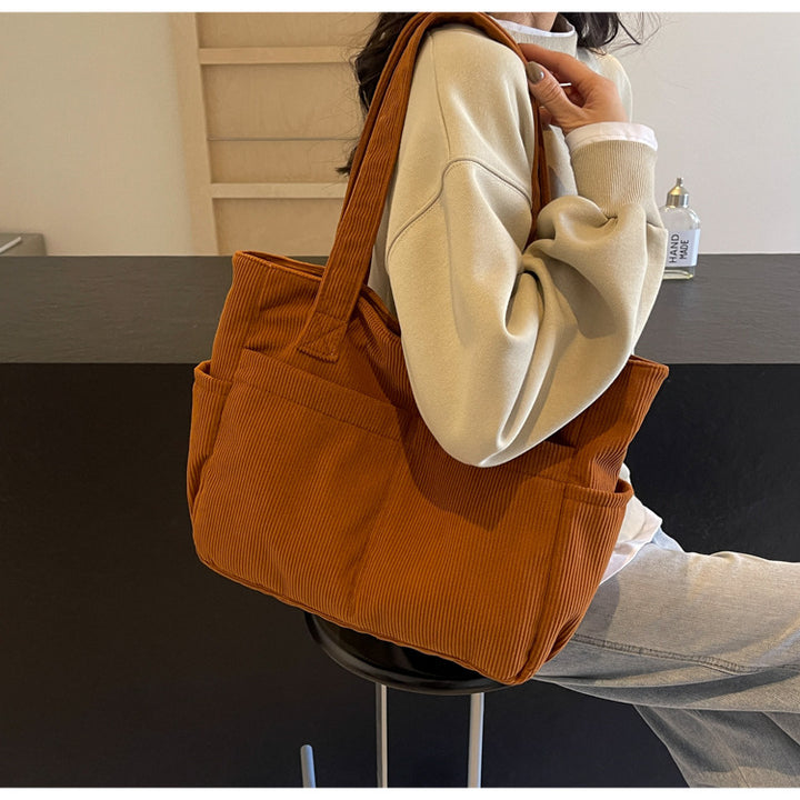 Multifunctional shoulder bag with large outer pockets Kalsten