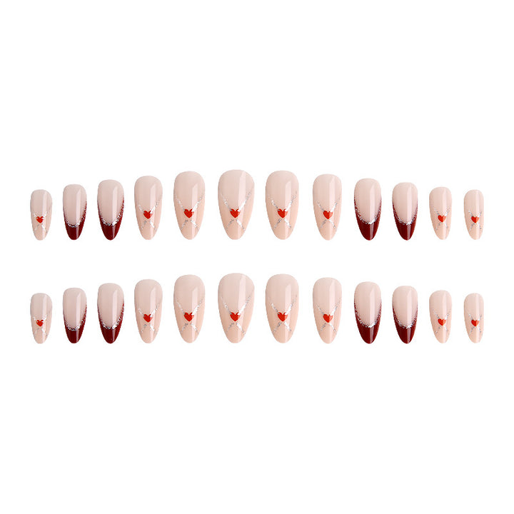 Acrylic nails with heart motifs and glitter details Kalsten