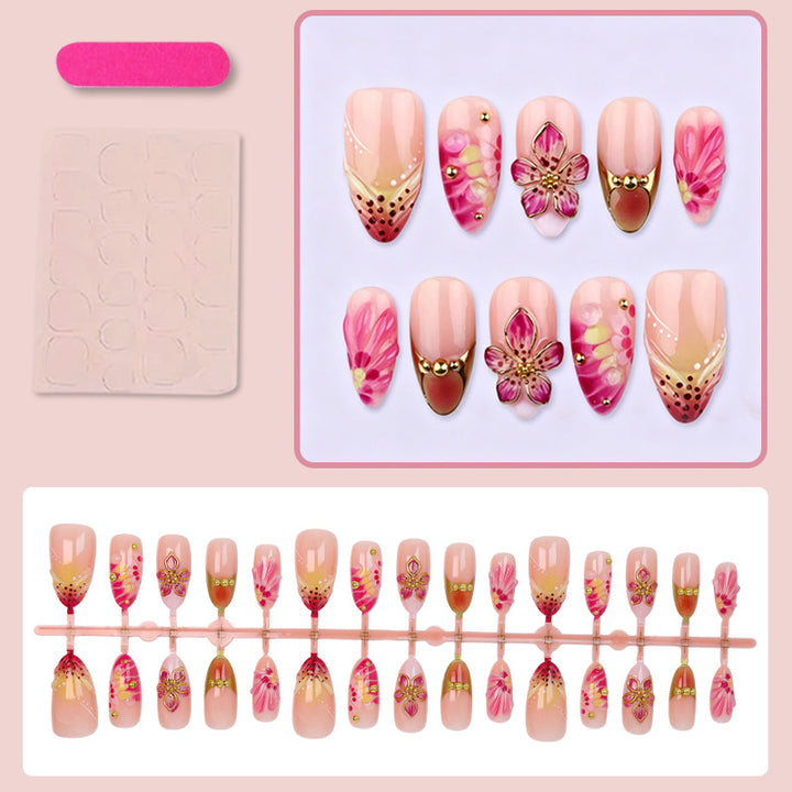 Artificial nail set with floral accents and sparkling details Kalsten