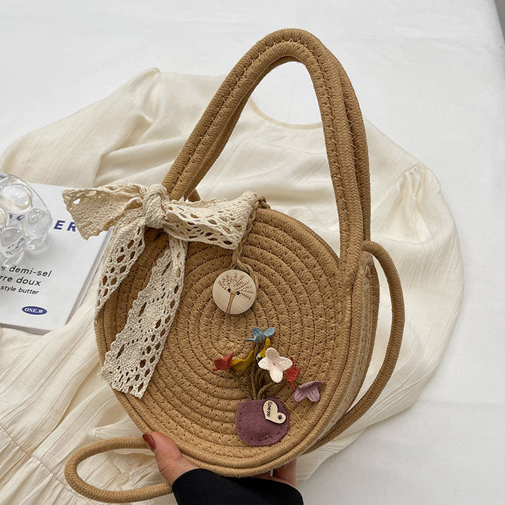Handcrafted Floral Accent Straw Bag