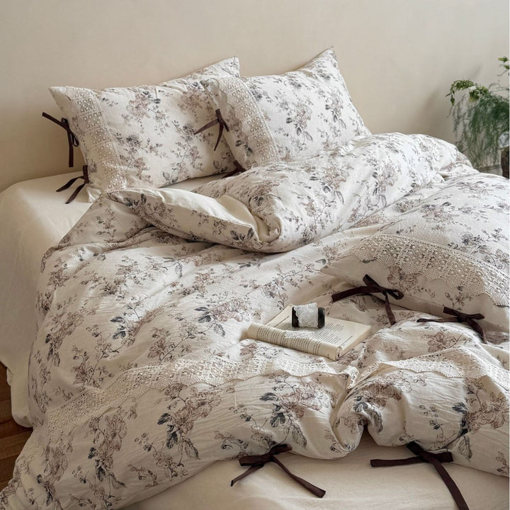 Romantic cotton-linen bedding set with lace trim and decorative ribbons