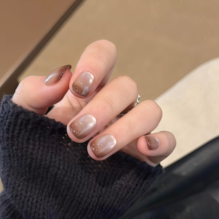 Artificial nails with elegant gradient color and glitter elements Kalsten