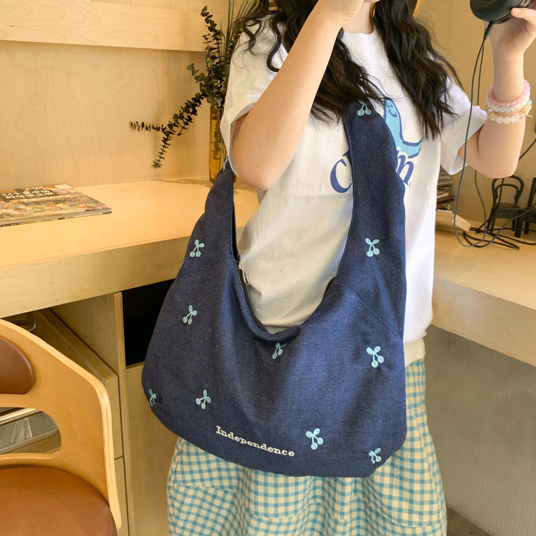 Comfortable shoulder bag with original embroidery motif Kalsten
