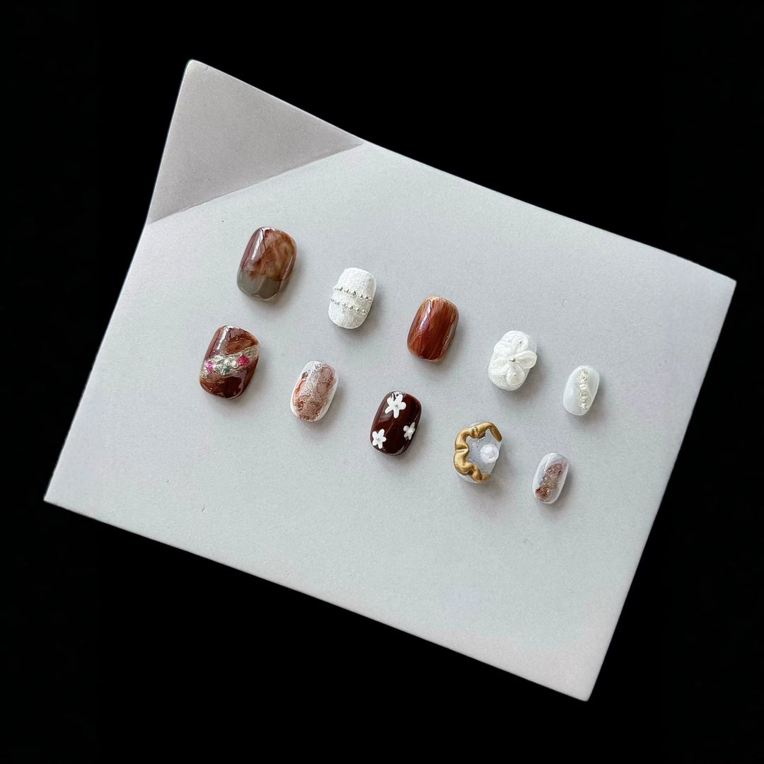 Artistic Press-On Nail Set with Unique Textures and Designs