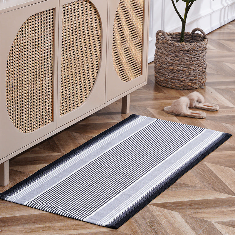 woven living room runner with fringes and geometric weave pattern