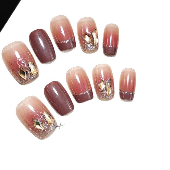 Acrylic nails in elegant ombre design with glitter elements Kalsten