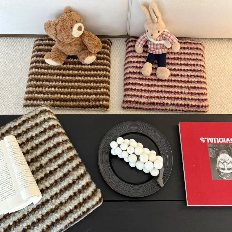 Knitted decorative cushion with wool blend and retro stripe texture