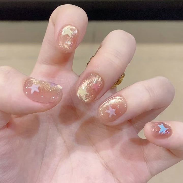 Star-Themed Glittery Nail Art Kalsten