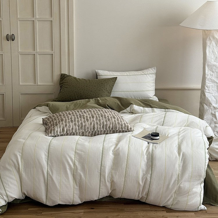 Breathable linen-cotton bedding set with quilted stripes and reversible design