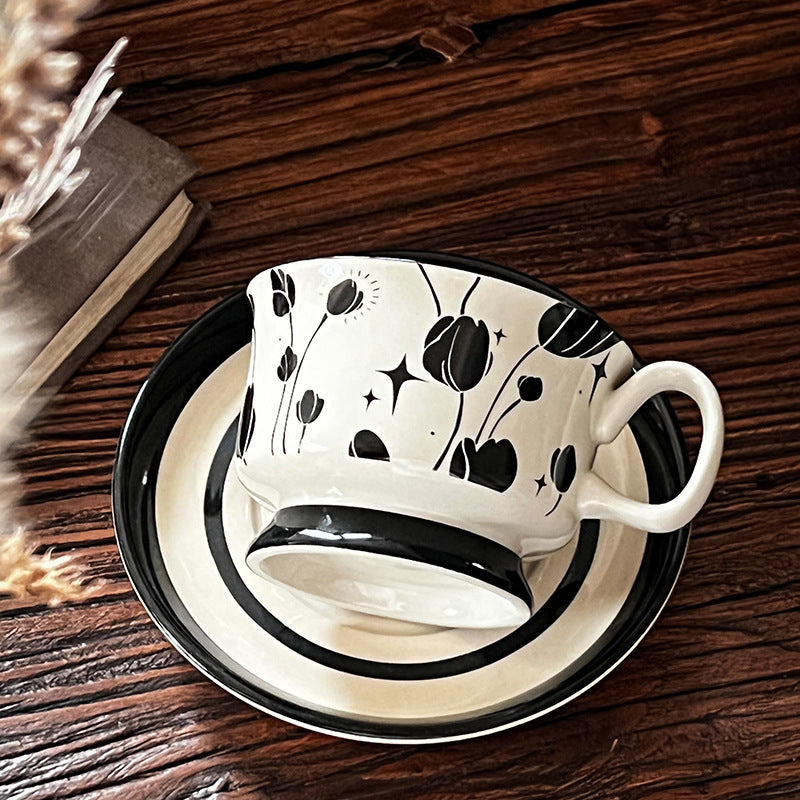 Ceramic coffee cup set with saucer and hand-painted leaf ornament