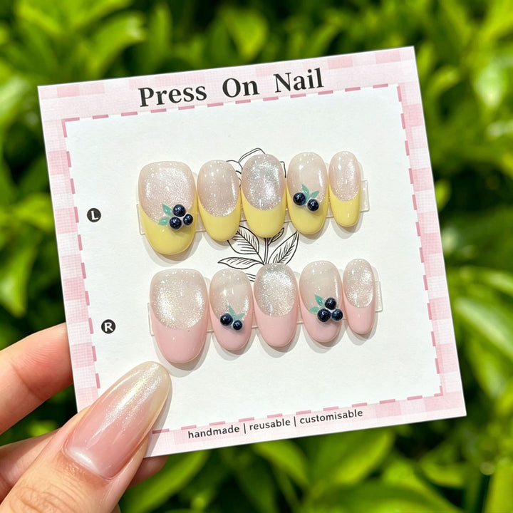 Artistic Press-On Nail Set with Tropical and Floral Accents