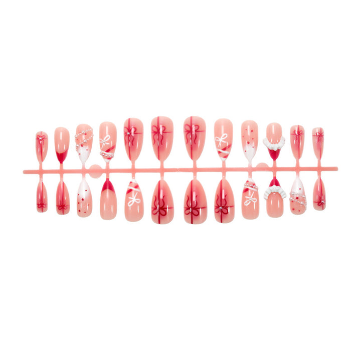Nail set with glamorous bows and elegant pearl embellishments Kalsten
