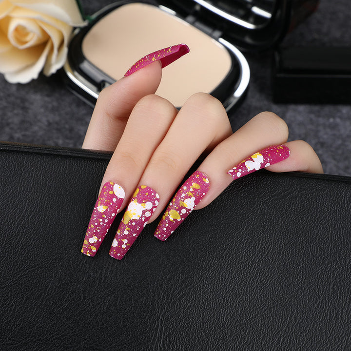 Artistic splatter design artificial nails Kalsten