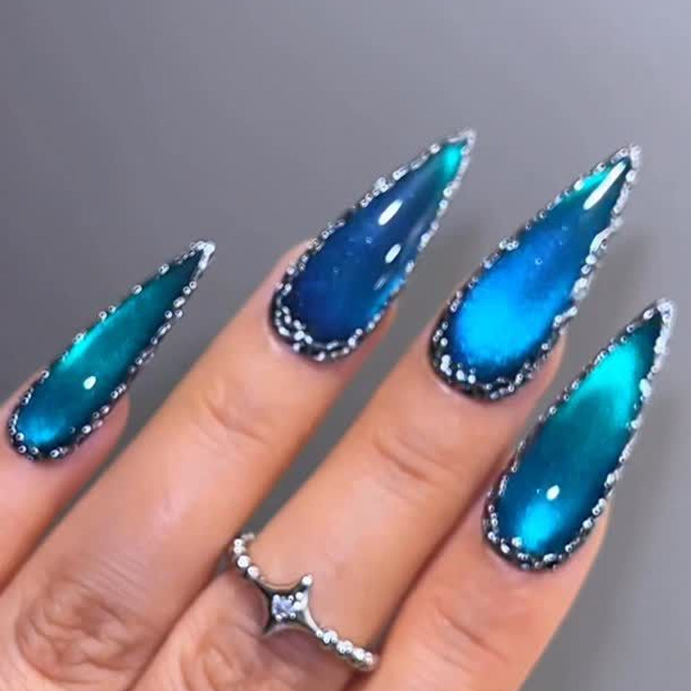 Glamorous artificial nails in elegant stiletto design with sparkling accents Kalsten