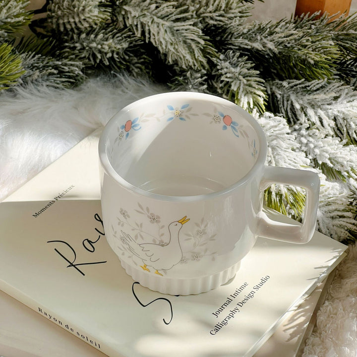 Decorative porcelain soup plate with ribbed edge and duck motif