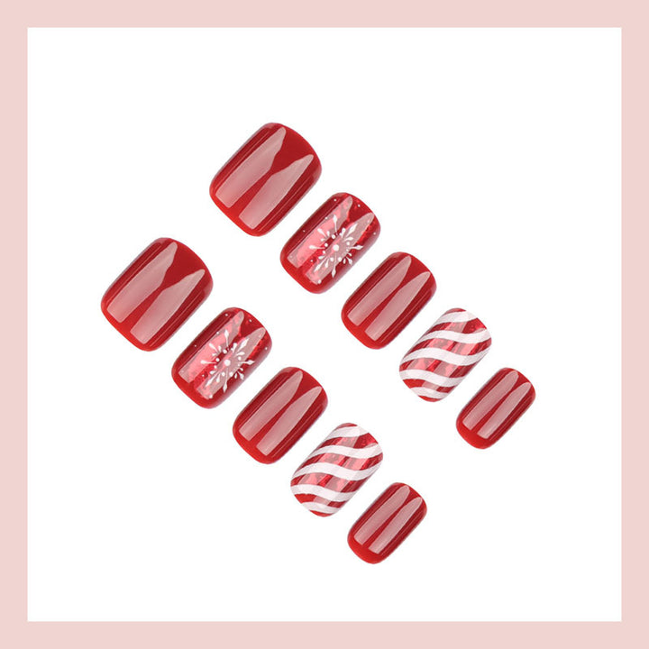 Artificial nail set with festive winter motifs and glitter accents Kalsten