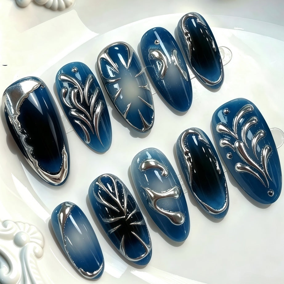 Glamorous artificial nails with unique metallic accents Kalsten