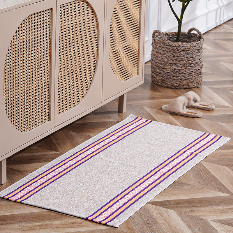 woven living room runner with fringes and geometric weave pattern