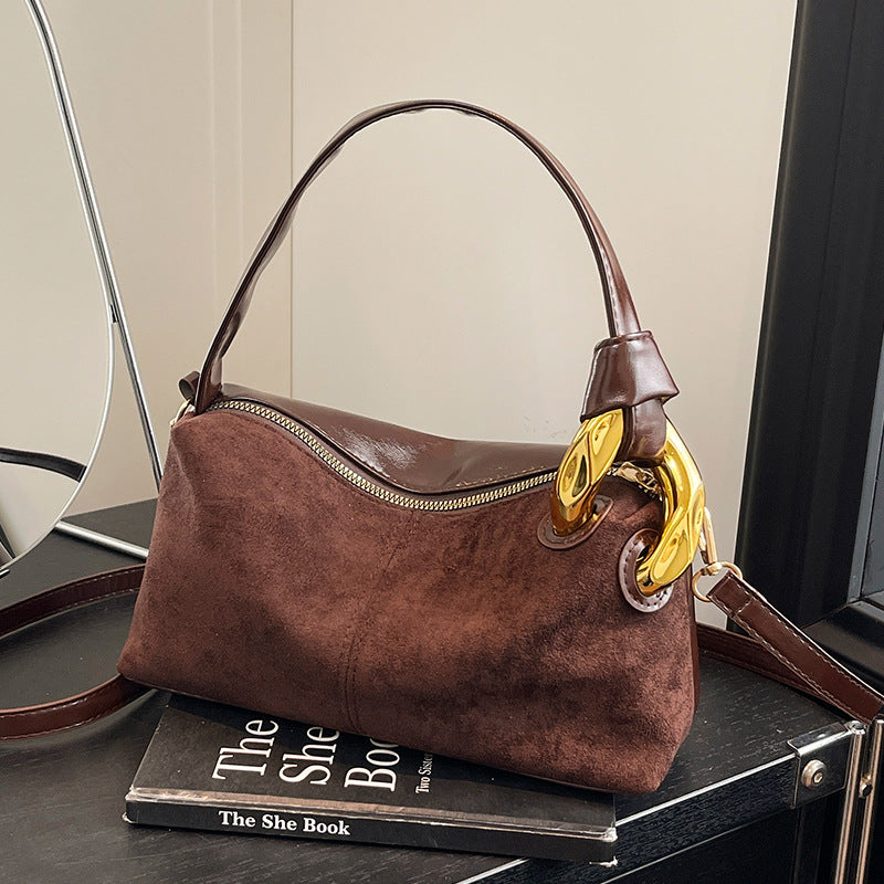Elegant Suede Handbag with Gold Accents