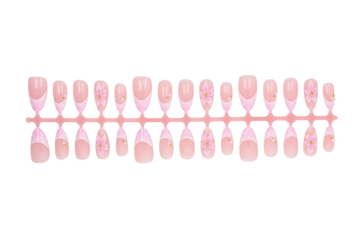Artificial nail set with floral accent design Kalsten
