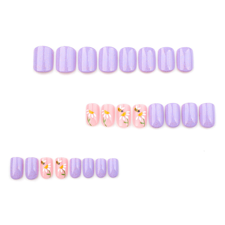 Artfully designed nail extensions with flower design Kalsten