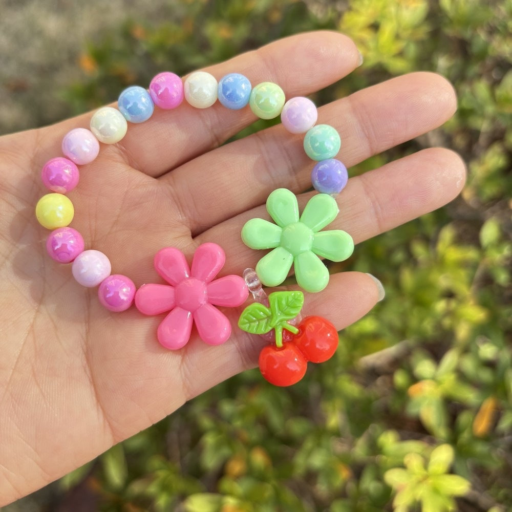 Colorful bracelet with flower charms Kalsten