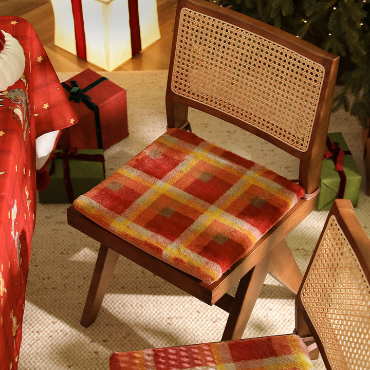 Padded chair cushion with checked plush cover and fastening ties