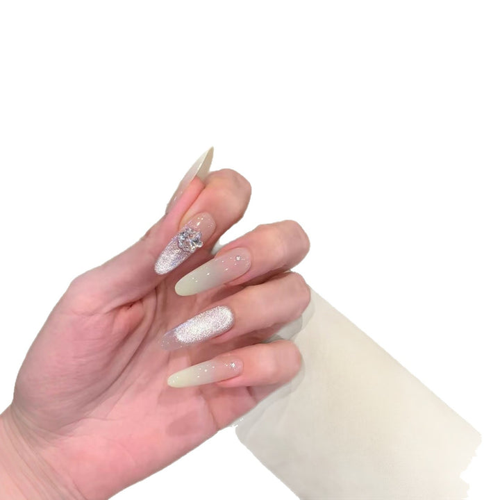 Glamorous Long Stiletto Nail Extensions with Rhinestone Accents