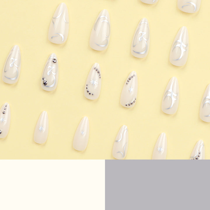 Artistic acrylic nails with elegant glitter patterns Kalsten