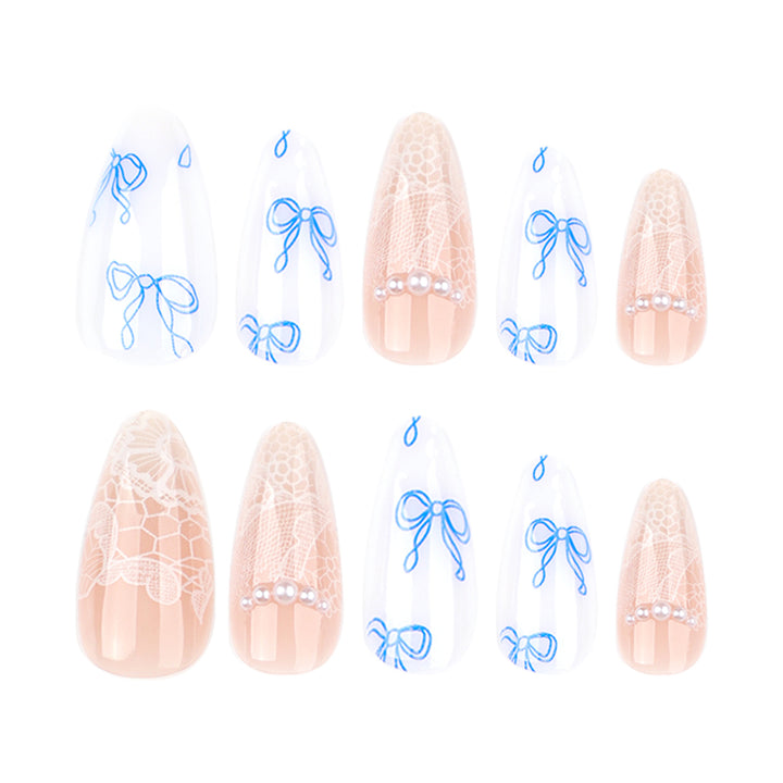 Artistic stiletto nails with delicate bow decorations Kalsten