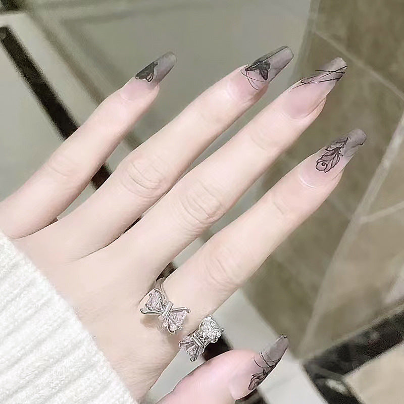 Artificial nails with floral designs Kalsten