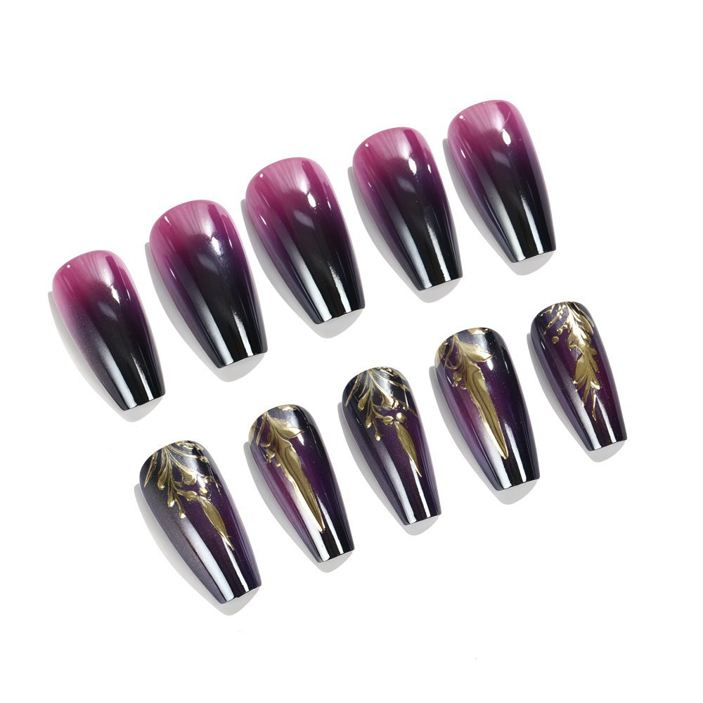 Artificial nails in elegant ombré design with gold accents Kalsten