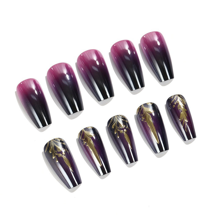 Artificial nails in elegant ombré design with gold accents Kalsten
