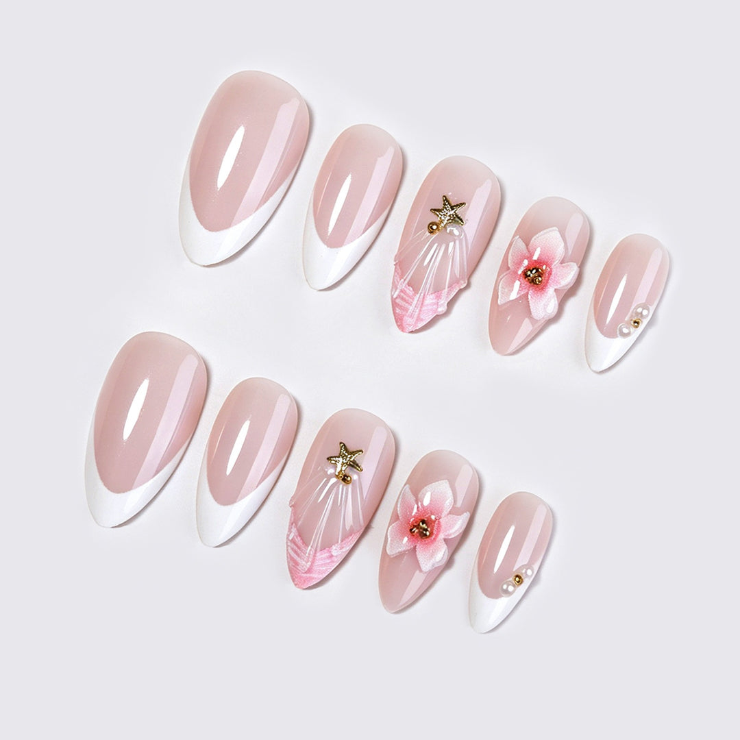 Artificial nail set with delicate flower and glitter applications Kalsten