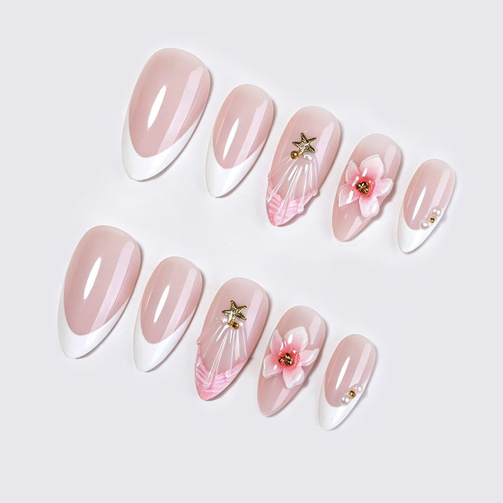 Artificial nail set with delicate flower and glitter applications Kalsten