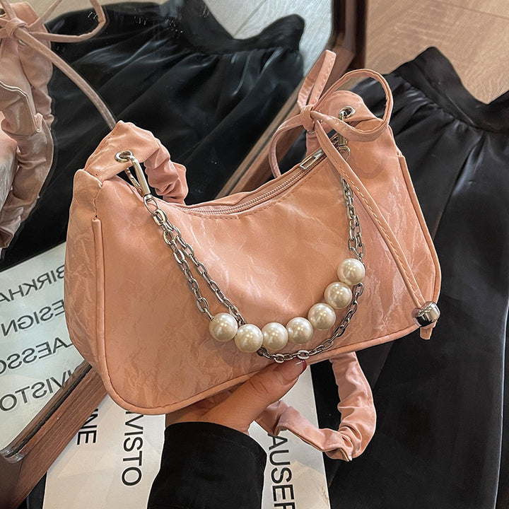 Elegant Pearl-Accented Handheld Bag