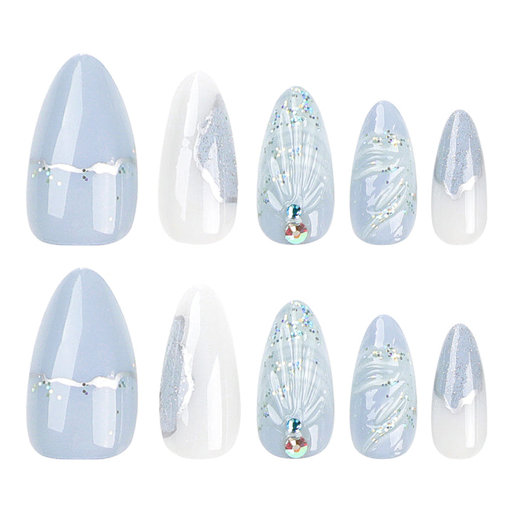 Artful stiletto nails with elegant glitter and floral design Kalsten