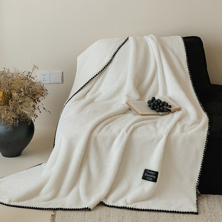 Extra soft microfleece throw blanket with decorative stitching