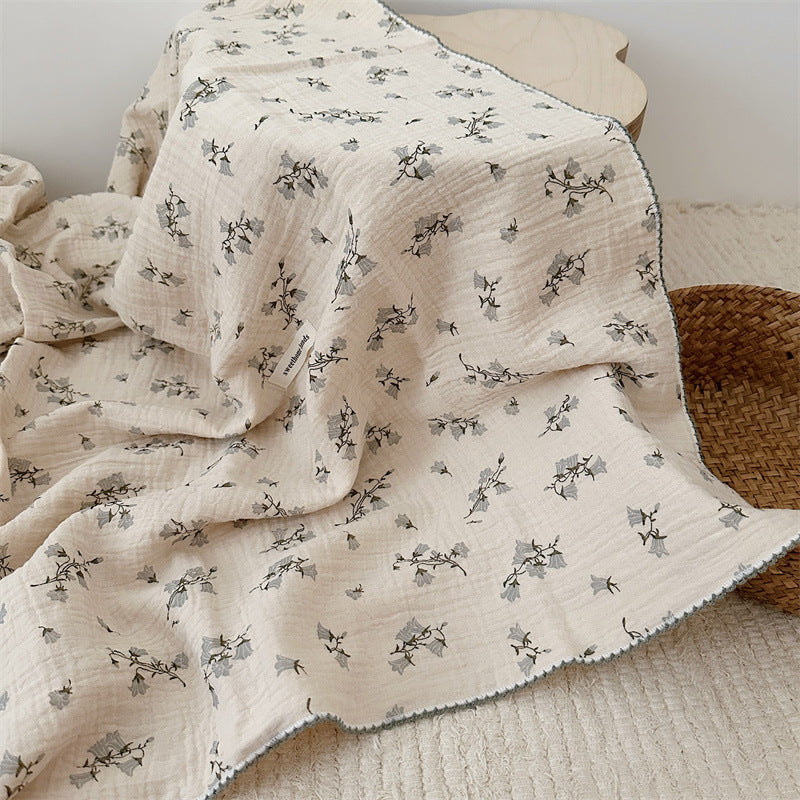 Unisex Muslin Blanket with delicate floral design and elegant ruffles Kalsten