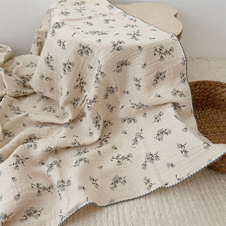 Unisex Muslin Blanket with delicate floral design and elegant ruffles Kalsten