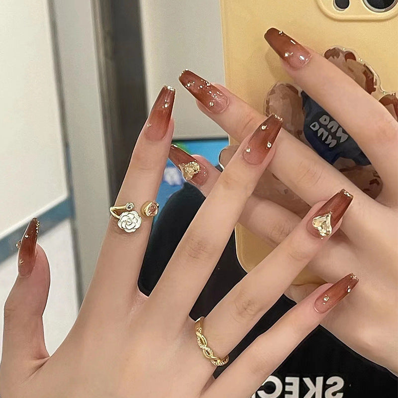 Glamorous artificial nails with sparkling accents Kalsten