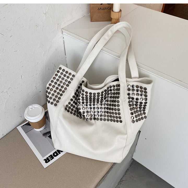 Fashionable shoulder bag with stylish rivet details Kalsten